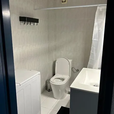 στην *